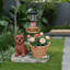 Statue d'extérieur de jardinière solaire chiot assis