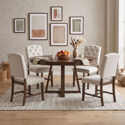 Ensemble de salle à manger rond extensible cinq pièces avec quatre chaises rembourrées