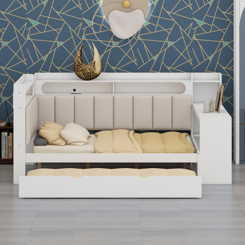 Structure de lit de jour tout-en-un avec bureau d'étude, lit gigogne sous le lit, tablettes organisées, solutions Smart Power, éclairage dynamique et appui-tête ergonomique Soft-Touch