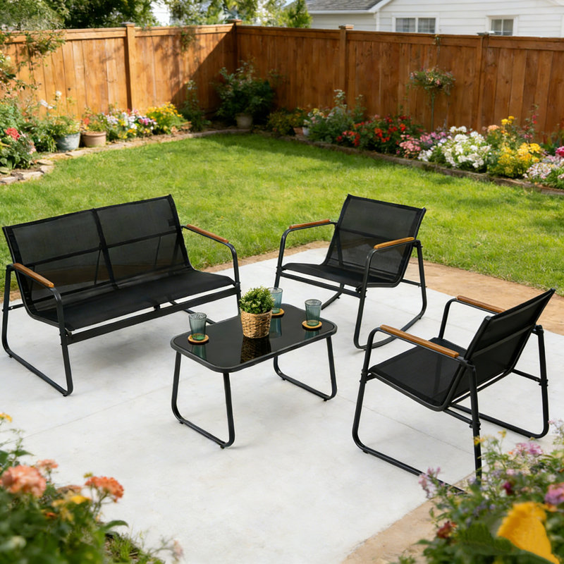 Kozyard 4-Piece Outdoor Patio Furniture Set with Textilene Chairs, Metal Conversation Set, Tempered Glass Coffee Table, Powder-Coated Steel Frame for Garden, Poolside, Backyard Black