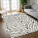 Prina Animal Print Area Rug