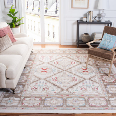 Chauncey Oriental Ivory Area Rug