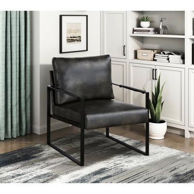 Chaise de salon élégante en similicuir et base en métal noir