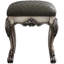 Tabouret de coiffeuse gris et blanc cassé de style vintage pour une chambre élégante, ajoutant une touche sophistiquée à votre espace.