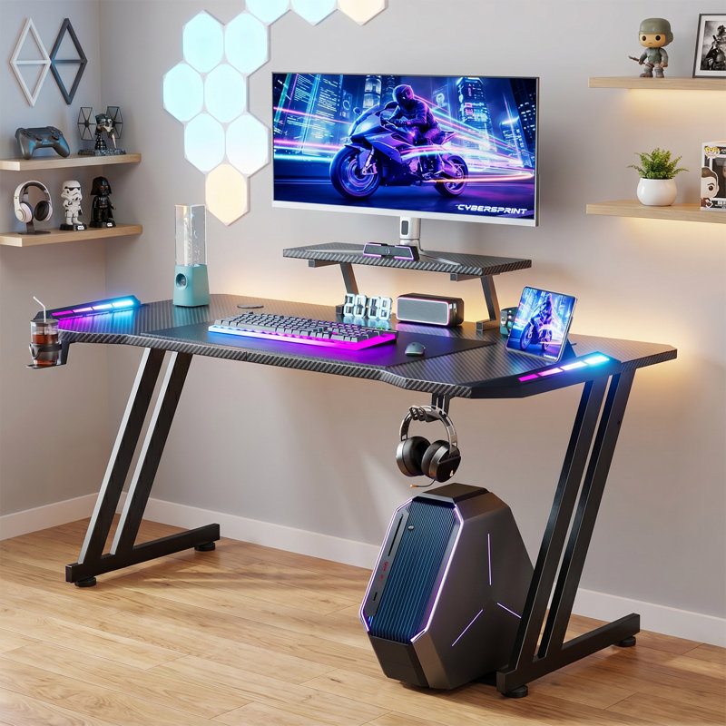 Z Shaped Ergonomic Gaming Desk with LED Lighting, Carbon Fibre Surface PC Workstation, Built-in Monitor Stand, Cup Holder & Headphone Hook for Gaming and Home Working, Black