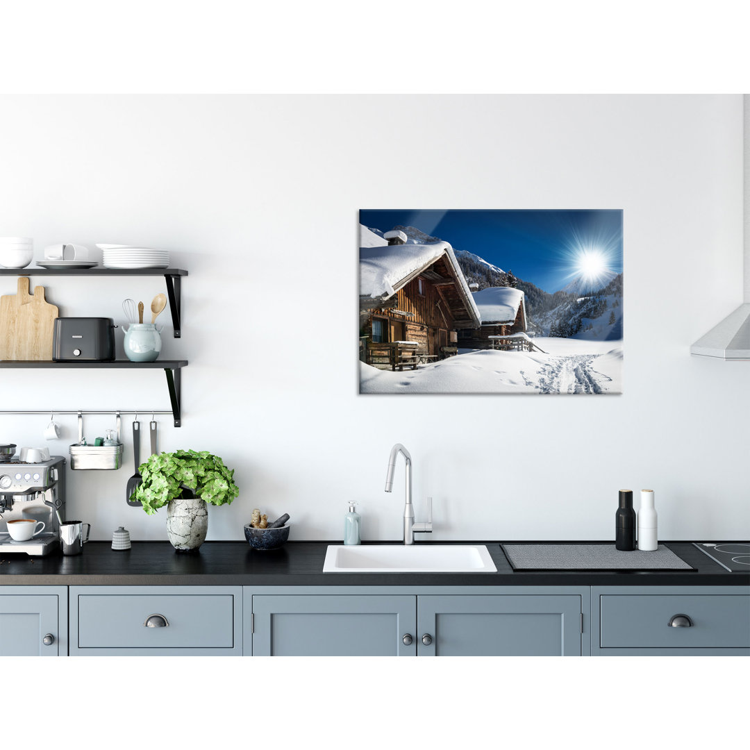 Ungerahmtes Foto auf Glas "Snowy Alpine Huts"