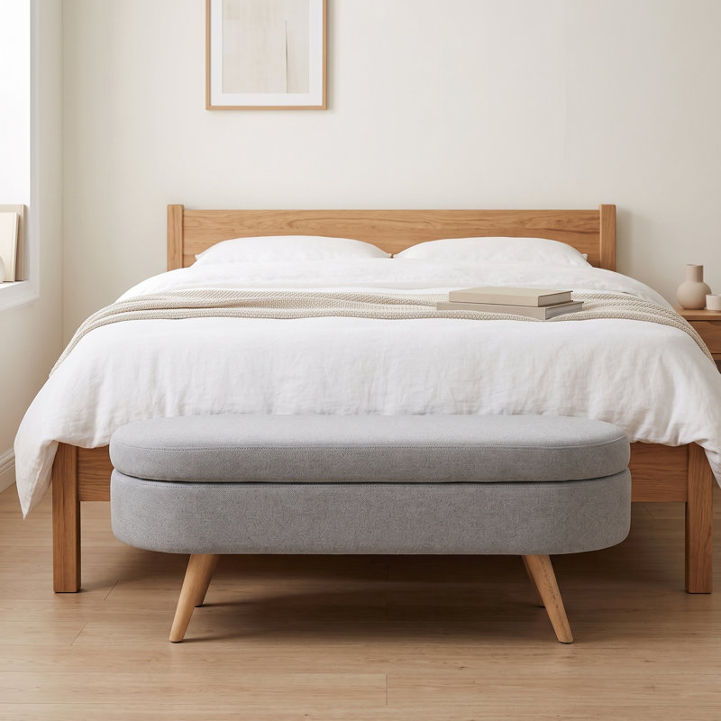 Banc de rangement avec repose-pieds ovale avec revêtement en tissu plissé, pieds en bois d'hévéa et compartiment de rangement caché - repose-pieds polyvalent, sièges supplémentaires et décoration de salon