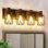 Luminaire de meuble-lavabo Farmhouse avec design en bois et métal noir, luminaire mural rustique 4 lumières pour l'éclairage de salle de bain, de couloir et de miroir