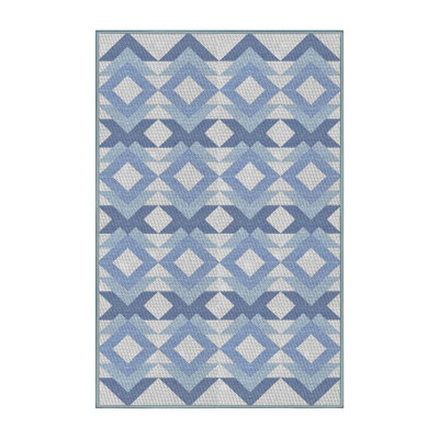 Tapis bleu ciel à motifs