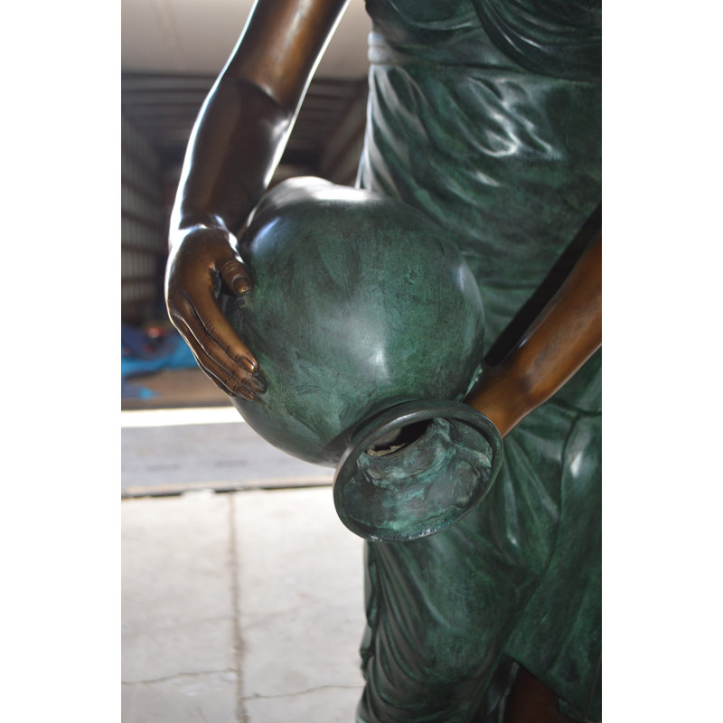 Metal Girl Holding a Pot on Shell Fountain