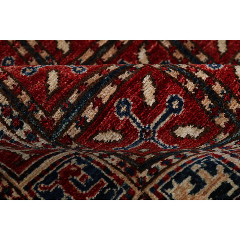 Aryana Wool Southwestern Area Rug in Red