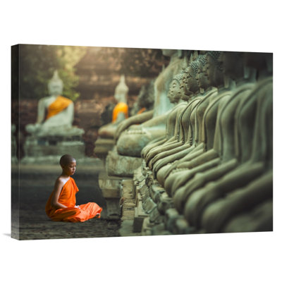 " Young Buddhist Monk Praying; Thailand "