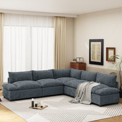 Modulaire gris foncé avec coussins et conception polyvalente pour l'espace de rangement du canapé de salon foncé
