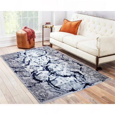 Tapis gris avec motifs abstraits Penina