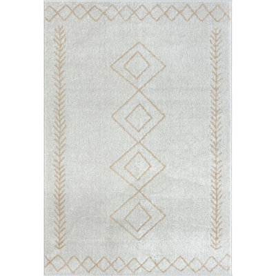 Tapis ivoire / beige à motif géométrique