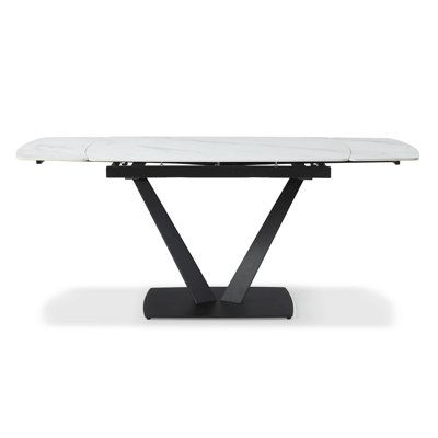 Extendable White Marble-Style Dining Table with Sculptural Black V Base