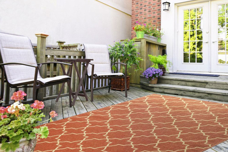 Outdoor patio, orange geometric rug