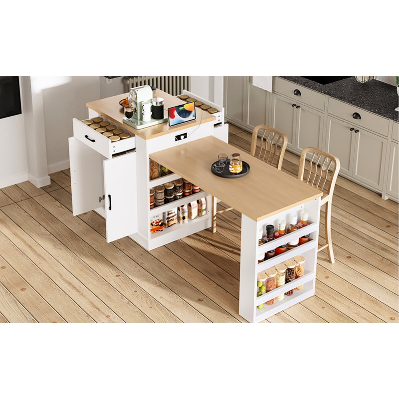Îlot de cuisine blanc avec comptoir réglable, tiroirs, armoires à double porte et étagères pour cuisiner à plusieurs.