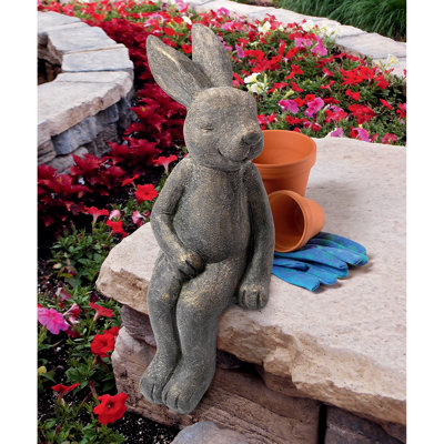 Statue lapin assis en lapin resida