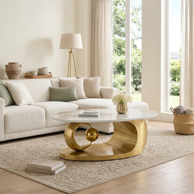 Table basse moderne et sculpturale de luxe 51,18 po avec plateau en verre trempé imitation marbre et structure en acier inoxydable doré