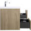 Meuble-lavabo flottant avec lavabo, conception murale pour une décoration de salle de bain moderne et peu encombrante.