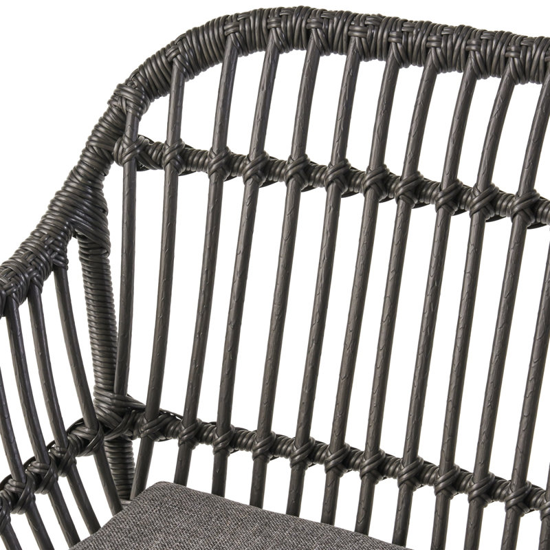 Chaise en rotin moderne Orlando avec coussins résistants à l'eau et structure en acier pour une utilisation intérieure et extérieure