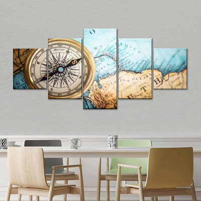 Ensemble de 5 boussoles en métal sur toile