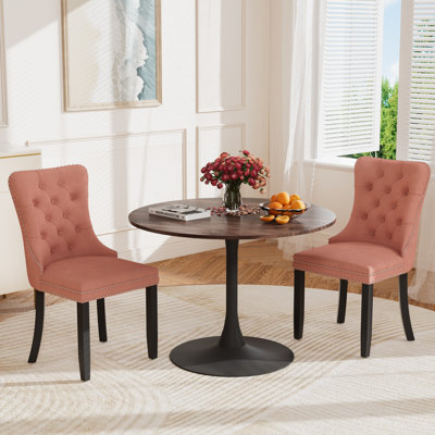 Ensemble repas rond à piédestal avec 2 chaises