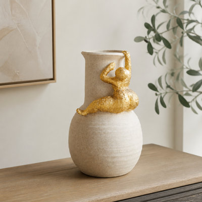 Vase d'appoint avec figurine dorée abstraite