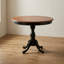 Ensemble de salle à manger rond 3 pièces en bois d'hévéa antique couleur cerisier noir, avec pied central et dossier à barreaux.