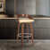 Maxime Swivel Counter or Bar Height Bar Stool with Open Low Back in Faux Leather and Wood