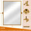 Miroir mural en fer