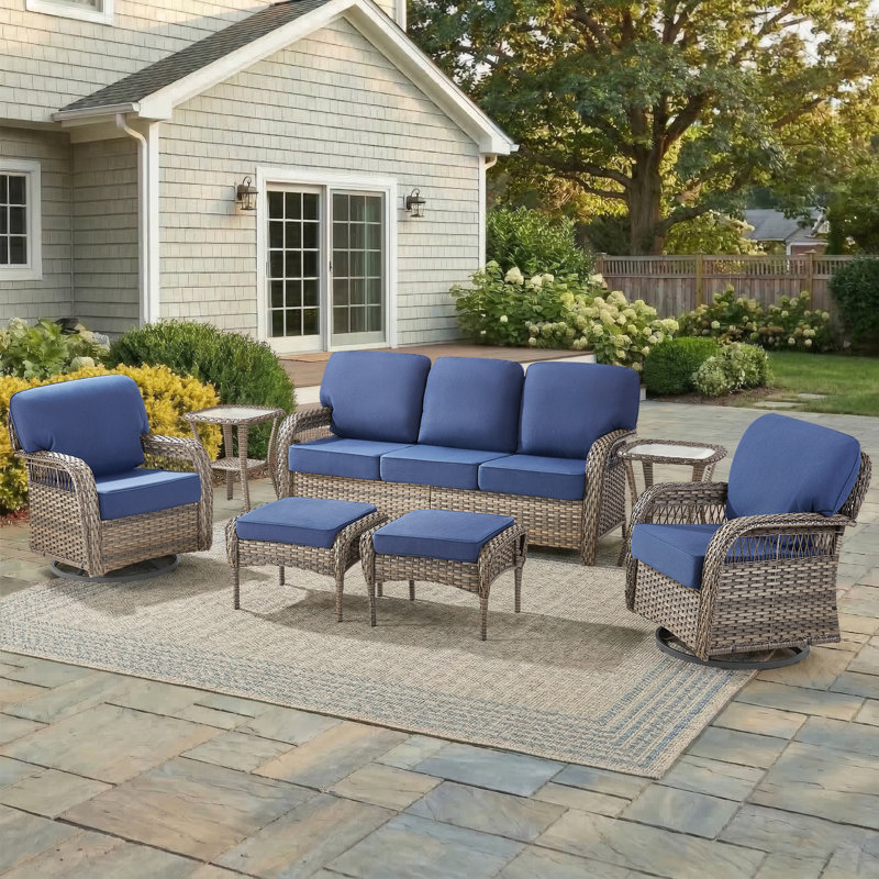 Ensemble de conversation d'extérieur en osier 7 pièces avec canapé, fauteuils pivotants, repose-pieds et tables d'appoint 7 pièces
