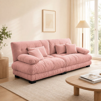 Canapé 2 places en chenille rose peluche avec assises profondes et moelleuses et coussins de salon