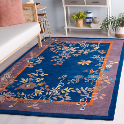 Seydou Hand Tufted Wool/Cotton Floral Rug in Navy/Brown