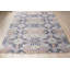 Tapis contemporain gris à motif de médaillon floral en laine nouée à la main gris