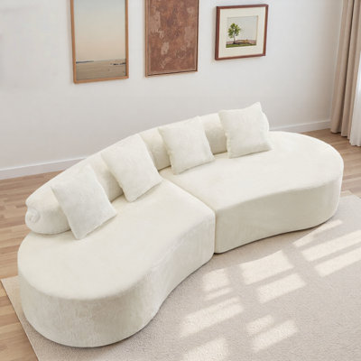 Canapé moelleux à haute densité avec conception modulaire courbée et coussins décoratifs doux