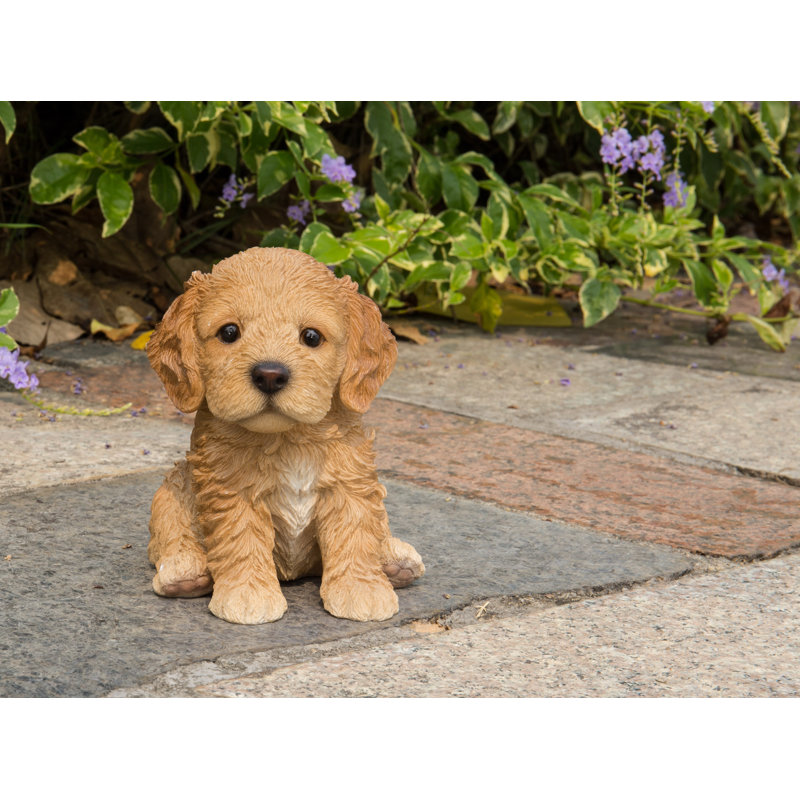 Statue chiot cockapoo assis