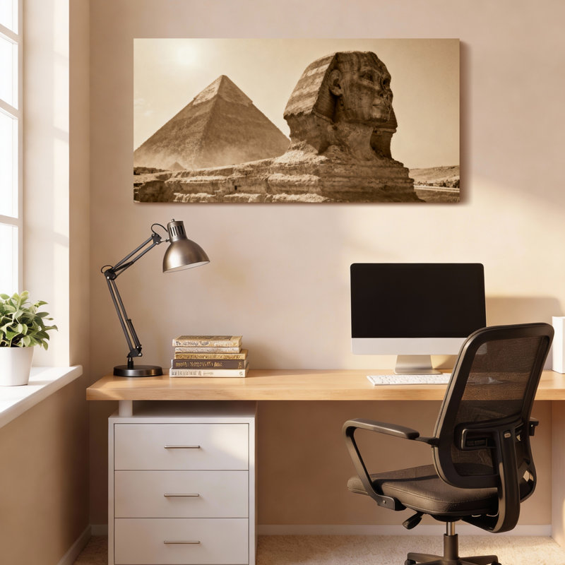 Ensemble de 1 tableau sur toile tendue représentant un sphinx et une pyramide égyptiens, tons sépia., H 24 po x l 48 po
