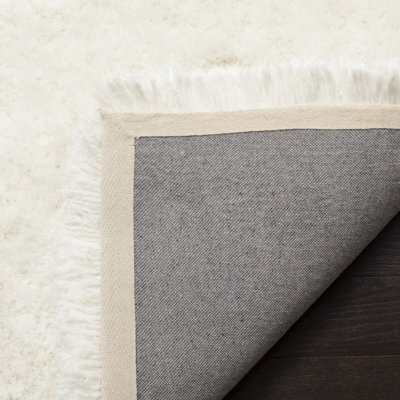 Handmade Tufted Ivory Area Rug