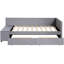 Lit simple tapissier en forme de L gris avec rangement. Revêtement en velours doux, tête de lit. Tiroirs pour la literie et les vêtements supplémentaires. Décoration latérale pour livres. Construisez une tête de lit confortable