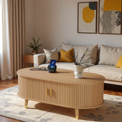 Table basse ovale cannelée avec station de charge, espace de rangement, porte de tambour coulissante et pieds en bois