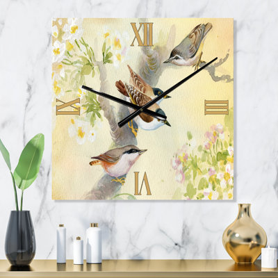 Horloge murale oiseaux sur un pommier en fleurs