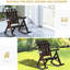 Chaise berçante en bois brun