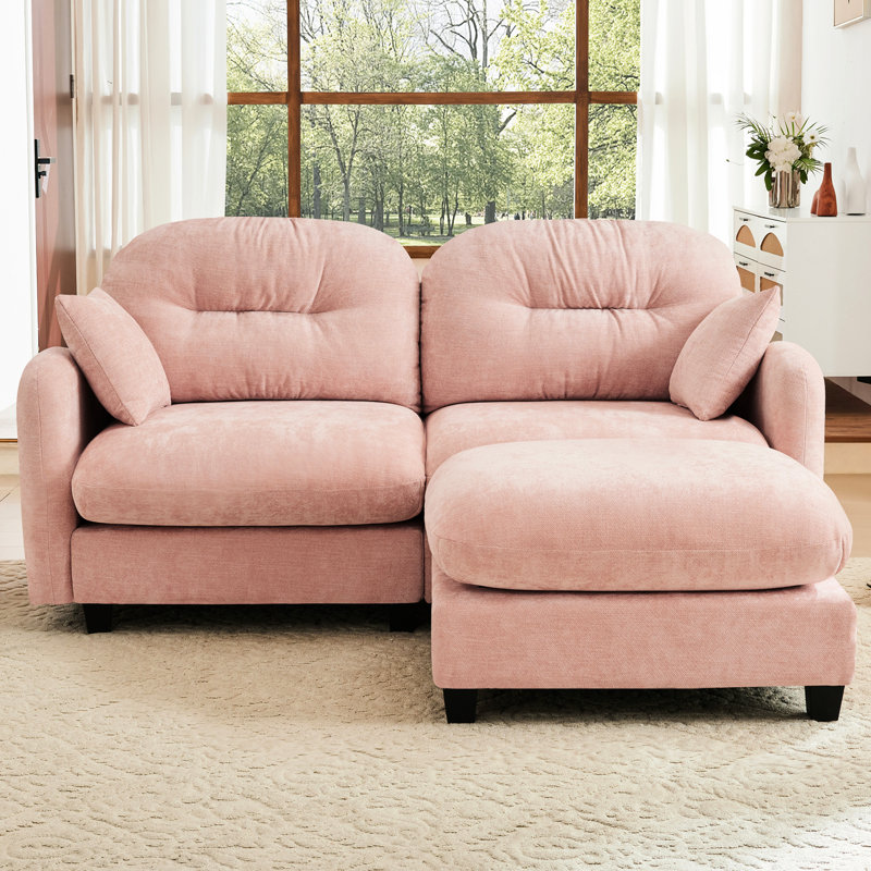 Canapé rose en forme de nuage avec assise moelleuse et douce en chenille