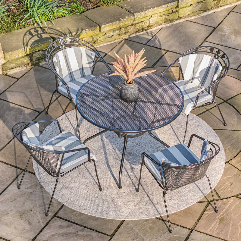 4 - Person Patio Dining Set with Round Table , Cushions Included