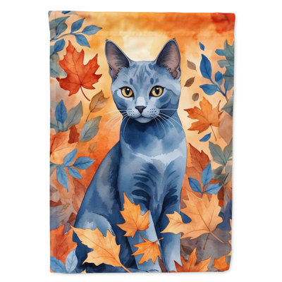 Chat en feuilles d'automne