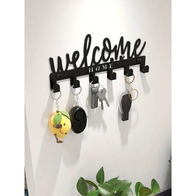 This one - piece adhesive - mounted key holder doubles as... - Metal - 1 Piece - Key Holder - Black - Multi-Key Organization