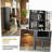 Black Metal Storage Cabinet With Tempered Glass Door, Adjustable Shelves, Anti-tip Device, Magnetic Soft-close System, And Adjustable Feet.