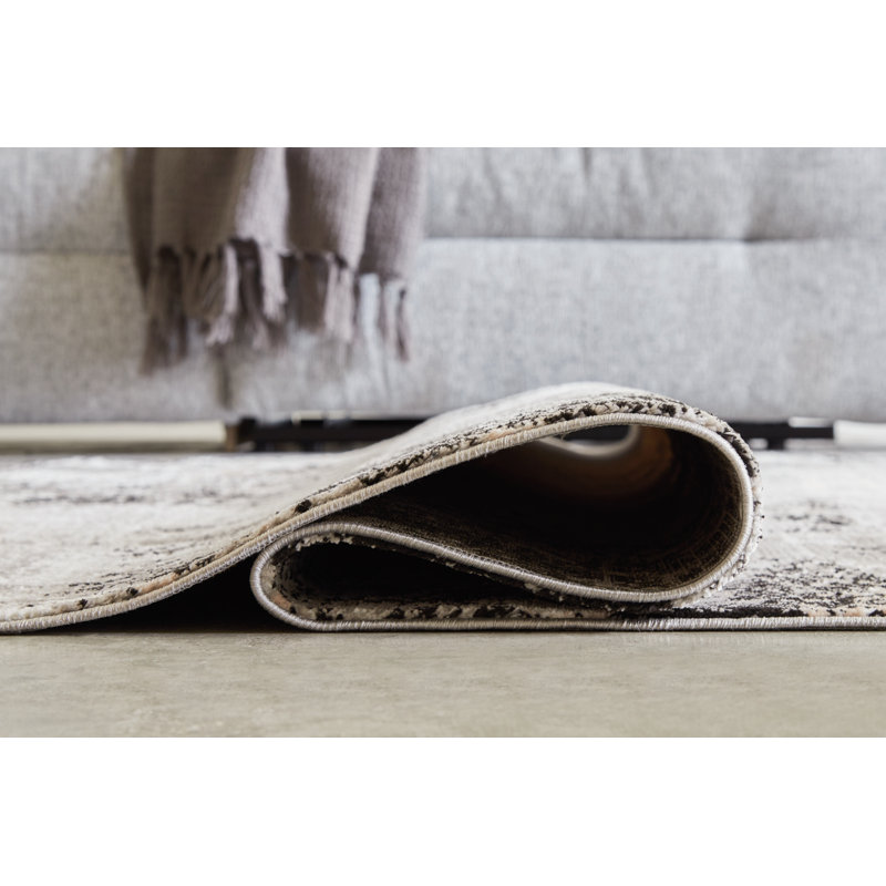 Langwell 10' x 14' Black and Gray Abstract Synthetic Rug